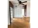 Cozy living room featuring a ceiling fan and ample natural light, creating a comfortable and inviting atmosphere at 6615 Beamer Way, Orlando, FL 32807