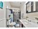 Charming bathroom with wainscotting, a vanity, toilet, and shower-tub combination at 701 Saint Michael Ln, Altamonte Springs, FL 32714