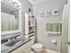 Well-maintained bathroom with a vanity, toilet, and shower-tub combination at 701 Saint Michael Ln, Altamonte Springs, FL 32714