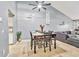Open dining area with neutral paint and vaulted ceilings adjacent to the living room at 701 Saint Michael Ln, Altamonte Springs, FL 32714
