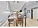 Dining area showcasing high ceilings and view into living spaces of home at 701 Saint Michael Ln, Altamonte Springs, FL 32714