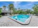 Community pool offers an inviting recreational space with ample lounging and green landscape at 701 Saint Michael Ln, Altamonte Springs, FL 32714
