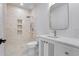 Modern bathroom with a glass-enclosed shower and contemporary vanity, offering a clean and stylish design at 734 Terra Pl, Maitland, FL 32751