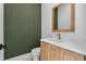 Stylish powder room with custom vanity, modern fixtures, and elegant design at 734 Terra Pl, Maitland, FL 32751