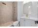 Bathroom featuring neutral tiling, glass enclosed shower, toilet, and white vanity at 734 Terra Pl, Maitland, FL 32751