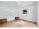 Bright bedroom with white walls, hardwood floors, and modern window at 734 Terra Pl, Maitland, FL 32751