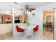 Cozy breakfast nook featuring a modern table and stylish chairs, seamlessly connecting to the living spaces at 737 Tanglewood Rd, Winter Springs, FL 32708