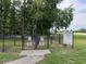 Dog park entrance with signs, providing a safe and enclosed area for residents and their furry friends at 737 Tanglewood Rd, Winter Springs, FL 32708