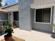 Inviting patio area with tiled flooring and potted plants at 737 Tanglewood Rd, Winter Springs, FL 32708