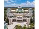 A beautiful clubhouse with a clock tower and dual staircases provides a welcoming atmosphere at 7647 Fairfax Dr, Kissimmee, FL 34747