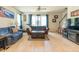 Comfortable living room offers tile flooring, natural light, and a cozy atmosphere at 87 Delacorte Way, Oviedo, FL 32765