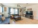 Inviting living room with large windows that let in lots of natural light at 87 Delacorte Way, Oviedo, FL 32765