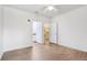 Hardwood floor bedroom leading into kitchen and bathroom at 8824 Villa View Cir # 204, Orlando, FL 32821