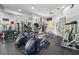 Well-equipped gym featuring cardio machines, free weights, and fitness equipment at 8824 Villa View Cir # 204, Orlando, FL 32821