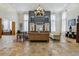 Spacious lobby featuring stylish seating, a decorative wall, and travertine flooring at 8824 Villa View Cir # 204, Orlando, FL 32821