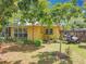 Charming home with a lush backyard, mature trees, and a well-maintained lawn at 920 Gloriosa Ave, Winter Park, FL 32789