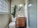 Small bathroom featuring a walk-in shower and small storage space at 920 Gloriosa Ave, Winter Park, FL 32789