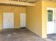 Well-maintained carport featuring a concrete floor and multiple entry points with neutral color tones at 920 Gloriosa Ave, Winter Park, FL 32789