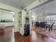 Hallway showing the dining room with decorative table and chairs at 920 Gloriosa Ave, Winter Park, FL 32789