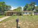 Charming single-story home featuring a mailbox and a spacious front yard at 920 Gloriosa Ave, Winter Park, FL 32789