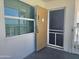 Inviting condo entrance with natural light from a large window and door at 935 S Atlantic Ave # 355, Daytona Beach, FL 32118