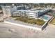 Aerial view of oceanfront condos at the Ocean Jewels Club with pool, lounge area and beach access at 935 S Atlantic Ave # 355, Daytona Beach, FL 32118