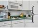This functional kitchen is equipped with modern appliances and sleek cabinetry at 935 S Atlantic Ave # 355, Daytona Beach, FL 32118