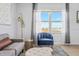 This living room features comfortable seating and an ocean view at 935 S Atlantic Ave # 355, Daytona Beach, FL 32118