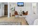 Inviting condo with a table and chairs beside the bedroom, plus entry to the bathroom and kitchen at 935 S Atlantic Ave # 355, Daytona Beach, FL 32118