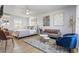 Stylish condo layout featuring a bed, couch, and dining area in Daytona Beach Shores at 935 S Atlantic Ave # 355, Daytona Beach, FL 32118