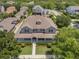 Spacious home with a classic design, well-maintained lawn, and inviting front porch at 10100 Loblolly Pine Cir, Orlando, FL 32827