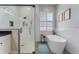 Modern bathroom featuring frameless shower, soaking tub, and stylish shutters at 10100 Loblolly Pine Cir, Orlando, FL 32827