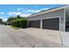 Attached two-car garage offering ample parking space and convenient access to the home at 10100 Loblolly Pine Cir, Orlando, FL 32827