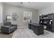 Study with natural light, desk, and built-in shelves for storage at 10100 Loblolly Pine Cir, Orlando, FL 32827