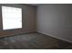 Bedroom featuring neutral carpet, natural light, and freshly painted walls at 1051 S Hiawassee Rd # 2136, Orlando, FL 32835