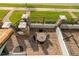 Aerial view of a backyard patio, featuring brick pavers and a dining set for outdoor enjoyment at 109 Kenny Blvd, Haines City, FL 33844