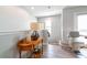 Hallway with wooden table and chair lift at 109 Kenny Blvd, Haines City, FL 33844