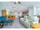 Spacious living area features bright lights, sleek floors, and an open concept kitchen area at 109 Kenny Blvd, Haines City, FL 33844