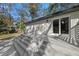 Spacious back deck with access to the backyard, offering a great space for outdoor living and entertainment at 11572 Se 60Th Ave, Belleview, FL 34420