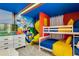 Fun ' bedroom featuring a bunk bed and custom slide for entertainment at 1221 Aloha Blvd, Davenport, FL 33897