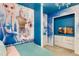 Themed ' bedroom featuring unique cartoon decor and a stylish bed at 1221 Aloha Blvd, Davenport, FL 33897