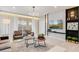 Inviting living space with contemporary decor, a large sliding glass door, and a relaxing ambiance at 1221 Aloha Blvd, Davenport, FL 33897