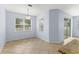 Bright dining area with tile flooring, a chandelier, and sliding door access at 12691 Calderdale Ave, Windermere, FL 34786