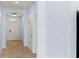 Bright entryway featuring neutral tile flooring and fresh, light blue walls at 12691 Calderdale Ave, Windermere, FL 34786