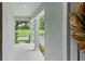 Inviting covered front porch with columns, offering a glimpse of the neighborhood view at 12691 Calderdale Ave, Windermere, FL 34786