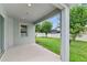 Covered patio overlooking backyard, offering a relaxing outdoor living space at 12691 Calderdale Ave, Windermere, FL 34786