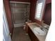Bathroom showcasing a bathtub, toilet, and sink vanity, ready for renovation to suit your tastes at 1420 Bethesda St, Apopka, FL 32703