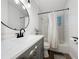 Updated bathroom features a sleek vanity, modern fixtures, and subway tile surround at 2114 Mount Vernon St, Orlando, FL 32803