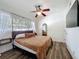 Bright bedroom with hardwood floors, natural light, and neutral decor at 2114 Mount Vernon St, Orlando, FL 32803