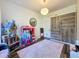 Bright bedroom with hardwood floors, modern light fixture, closet and unique decor at 2114 Mount Vernon St, Orlando, FL 32803